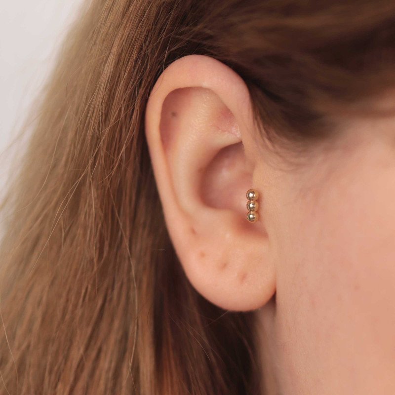 Üç Top Piercing