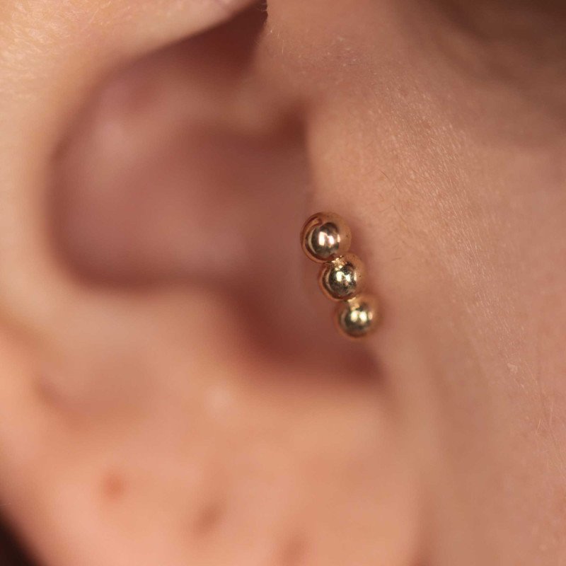 Üç Top Piercing