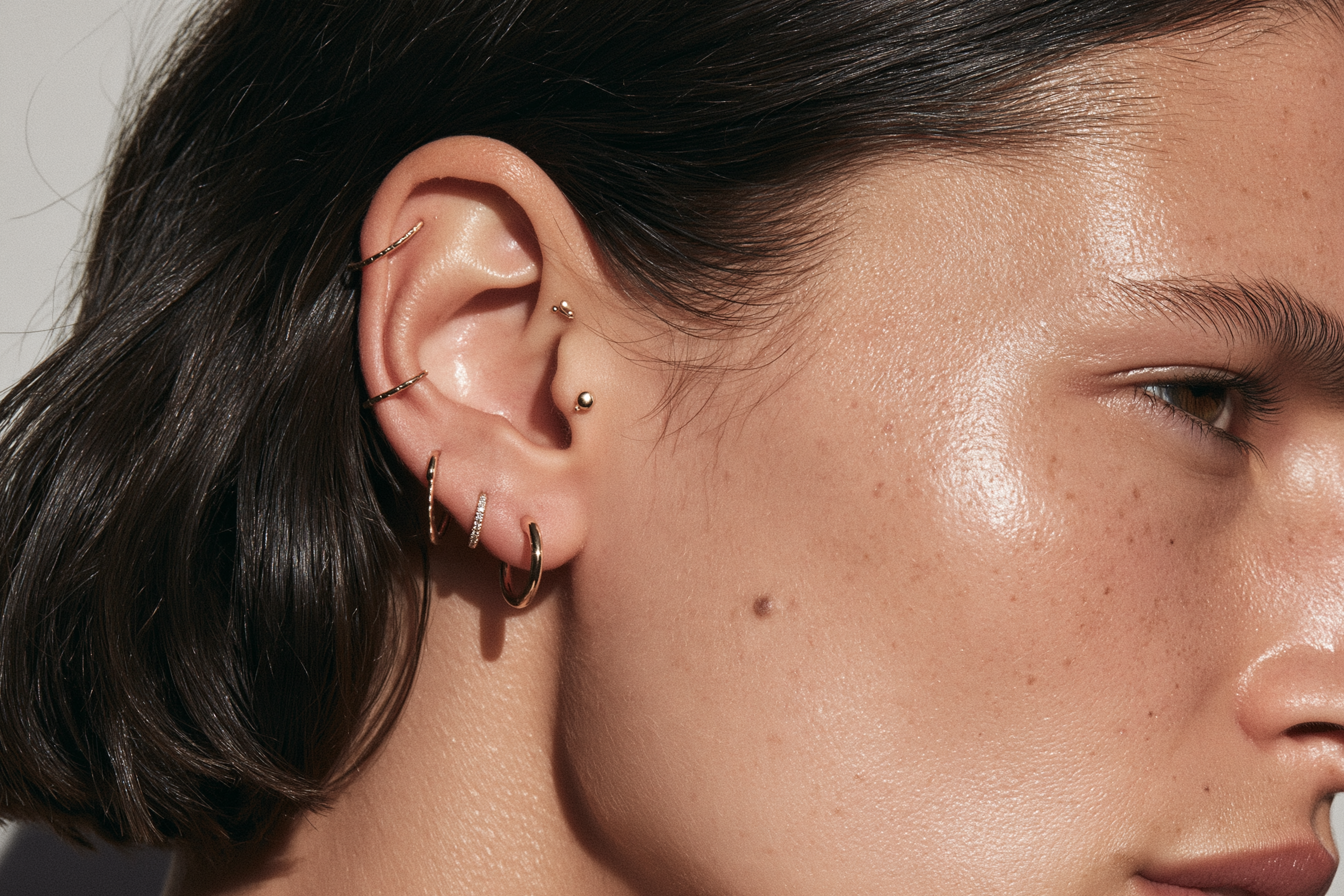 Different ear piercing types including lobe, helix, tragus, conch and rook